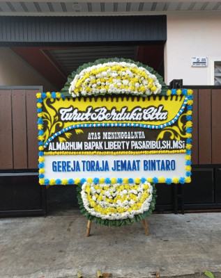 Papan Bunga Duka di 32 Ilir
